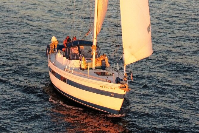 Mid-Day & Sunset Sailing on Seattle's Majestic Puget Sound - Discovery Park and West Point Lighthouse: a navigation landmark you can see