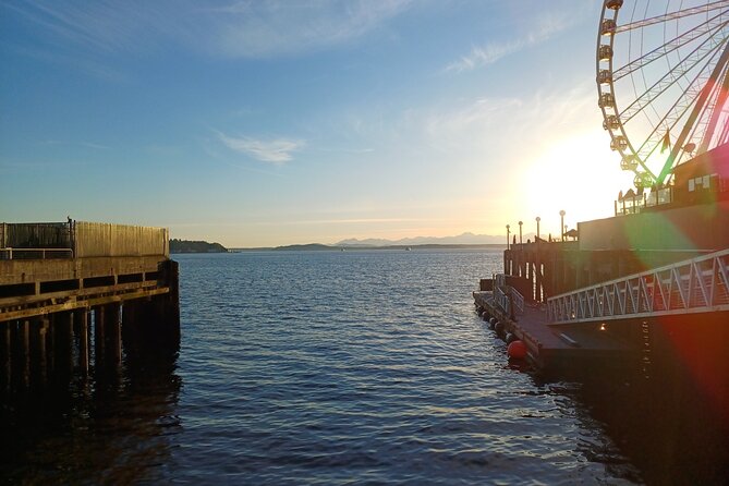 Seattle Waterfront Electric Scooter Tour with Great Wheel - Starting at Pier 57: Miner’s Landing, arcade energy, and the Great Wheel option